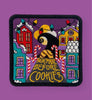 Patch with cartoon character and texts on a purple background